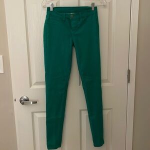 Green skinny jeans